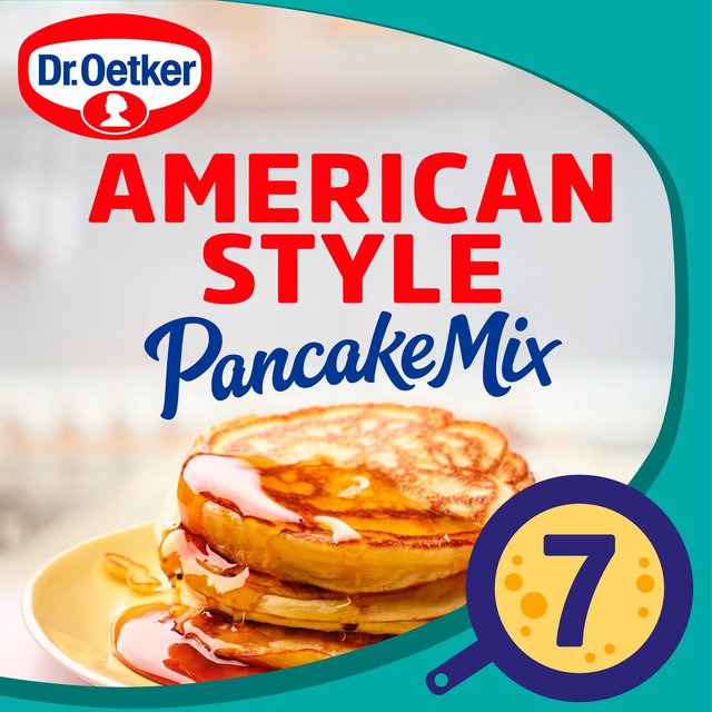 Dr. Oetker American Pancake Mix package featuring bold red text on a blue background, with an image of golden pancakes drizzled with syrup and a circular "7" icon.