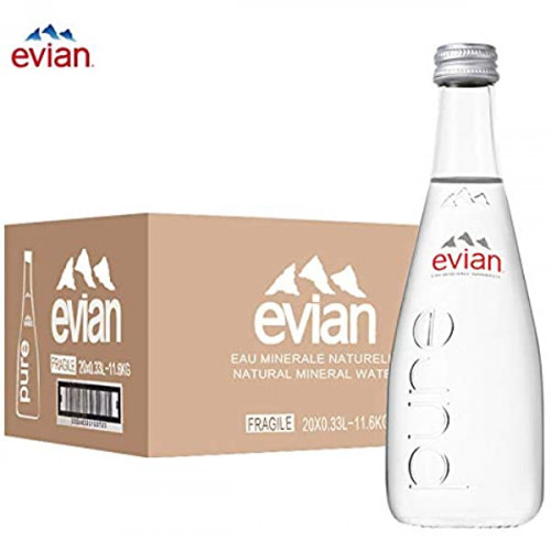 Clear glass Evian bottles in a multipack of 12, each 750 ml, with a minimalist design featuring the Evian logo and mountain graphic, alongside a cardboard box labeled "fragile."