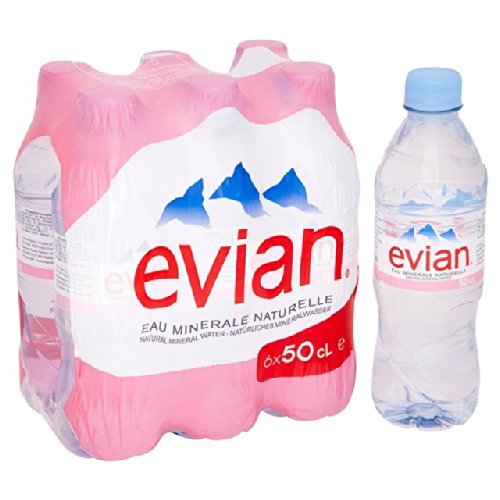 Six-pack of Evian natural mineral water bottles, each 50cl, with a pink plastic wrap and a single clear bottle beside it, featuring the Evian logo and iconic mountain design.