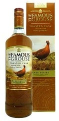 Amber whisky bottle with a label featuring a red grouse, packaged in a matching box; both display "The Famous Grouse Toasted Cask" and a rich, warm color scheme.