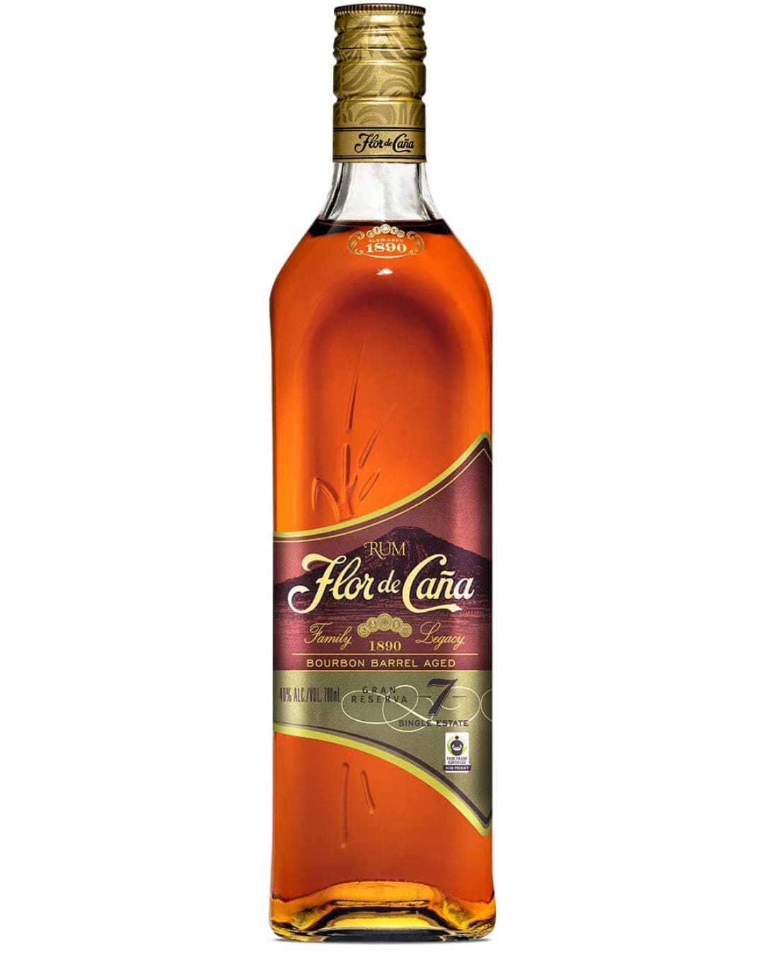 Flor De Cana 7 Year Old Rum Miniature, 5 cl, features a clear glass bottle with a golden amber liquid, a gold and maroon label, and a decorative gold cap.