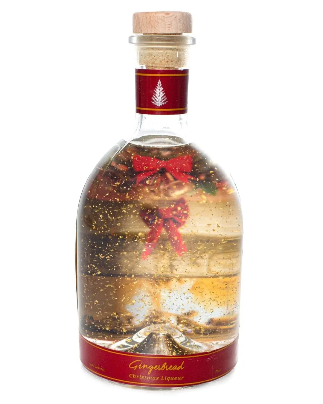 Clear glass bottle filled with golden gingerbread liqueur, featuring a festive red label, a cork stopper, and decorative elements like a bow and glitter inside.