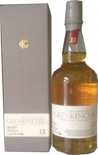 Amber whisky bottle with a silver cap, labeled "Glenkinchie 12 Year Old," alongside a matching grey box featuring gold accents and the brand logo.