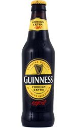 Dark glass bottle of Guinness Foreign Extra Stout, featuring a yellow and black label with the iconic harp logo and text, showcasing 330 ml size, part of a 24-pack.
