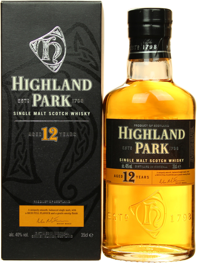 Highland Park 12 Year Old Whisky half bottle (35 cl) with a clear glass design, golden amber liquid, and a black box featuring gold lettering and a logo.