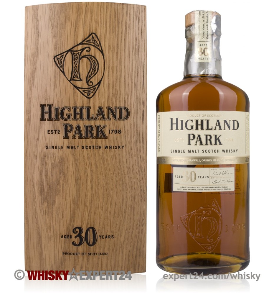 Highland Park 30 Year Old Whisky in a clear glass bottle with a cork stopper, displayed alongside a wooden box featuring the brand logo and age details.