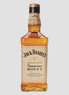 Jack Daniel's Honey Whiskey in a clear glass bottle, featuring a golden amber liquid, a black and gold cap, and a cream-colored label with "Tennessee Honey" prominently displayed.