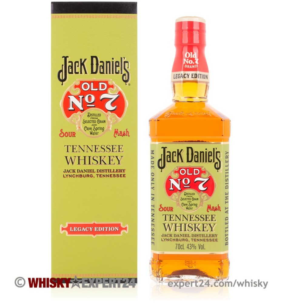 Jack Daniel's Sour Mash Legacy Edition features a clear glass bottle with a distinct square shape, filled with amber whiskey, alongside a vibrant green and yellow box.