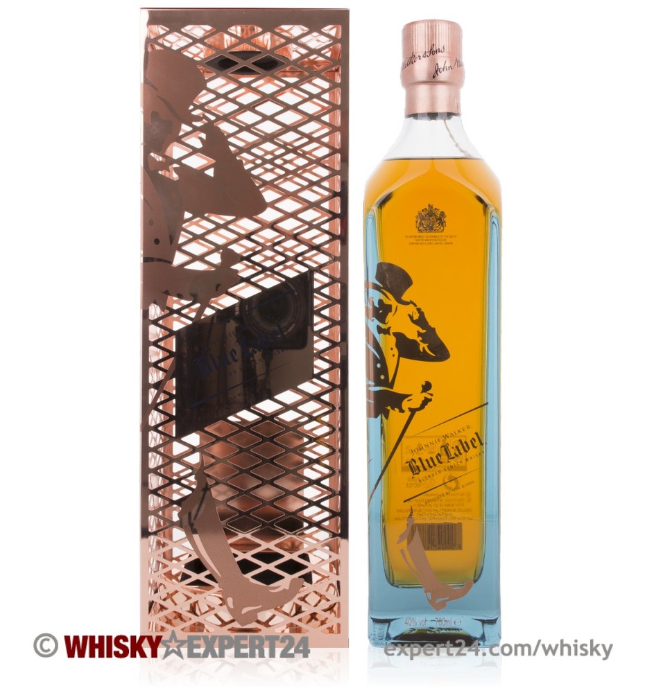 Limited edition Johnnie Walker Blue Label whisky in a clear glass bottle with a blue tint, featuring a copper-colored, intricately designed gift box with a silhouette of a man.