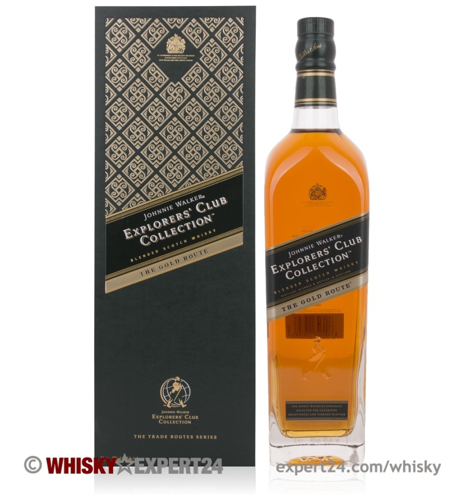 Johnnie Walker Explorer's Gold Route Whisky, 1 L, features a tall glass bottle with a golden amber liquid, a black and gold box with intricate patterns, and the logo prominently displayed.