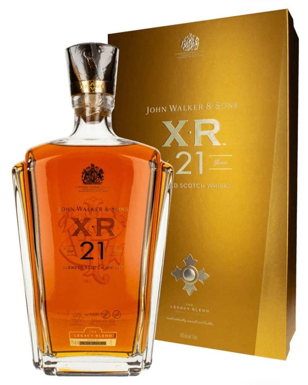 Amber whisky in a crystal-cut bottle with a square base, featuring a gold label and a gold box with the "X.R. 21" logo and a star emblem, indicating its 21-year aging.