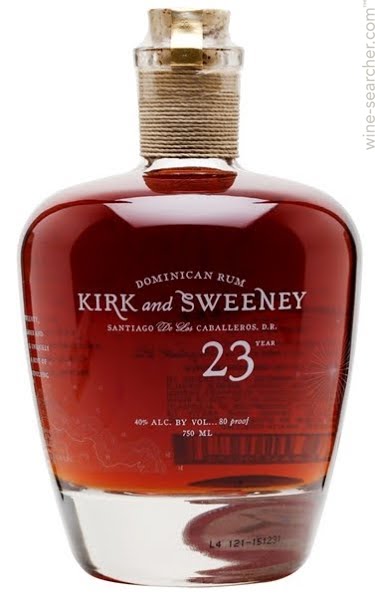 Kirk & Sweeney Gran Reserva Superior Rum in a distinctive rounded glass bottle with a cork stopper, featuring a rich amber color and elegant label detailing.