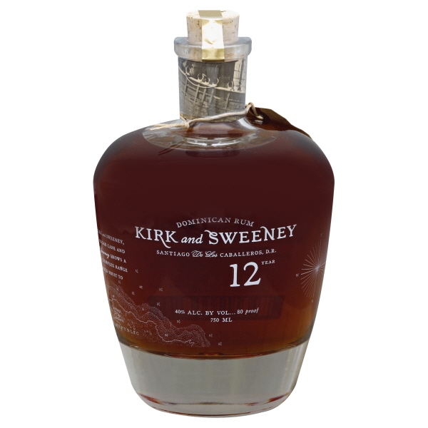 Kirk & Sweeney Reserva Rum bottle with a unique curved glass design, dark amber liquid, cork stopper, and a label featuring elegant white text and decorative elements.