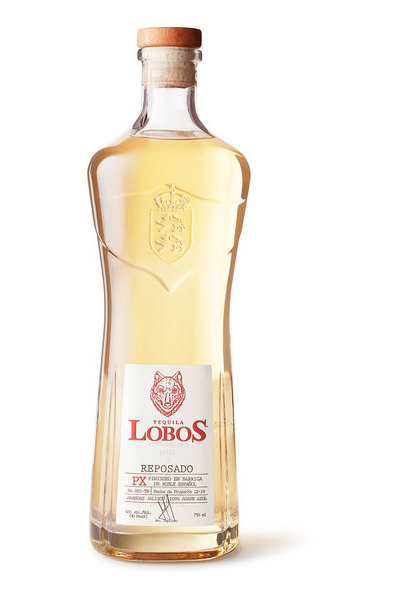 Clear glass bottle of Lobos 1707 Reposado Tequila, featuring a cork stopper, light amber liquid, and a prominent white label with red text and a wolf logo.