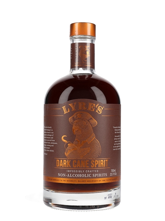 Lyres Dark Cane Spirit bottle, 700ml, features a deep amber liquid, clear glass with a round base, and a bronze label with elegant text and a lion emblem.