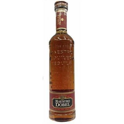 Clear glass bottle of Maestro Dobel Anejo Tequila, 70 Cl, featuring a rich amber liquid, embossed text, and a red and gold label with elegant detailing.