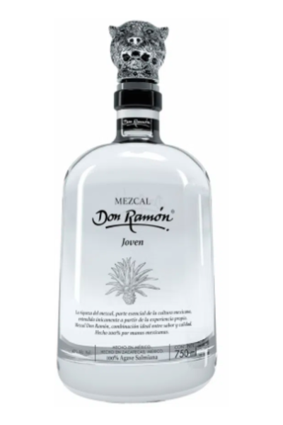 Clear glass bottle of Mezcal Don Ramon Joven, featuring a silver jaguar-shaped stopper, with a label showcasing the brand name and details in black and white.