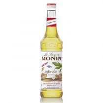 Clear glass bottle of Monin Toffee Nut Syrup, 70 Cl, featuring a white label with red and green accents, and illustrations of nuts and leaves.