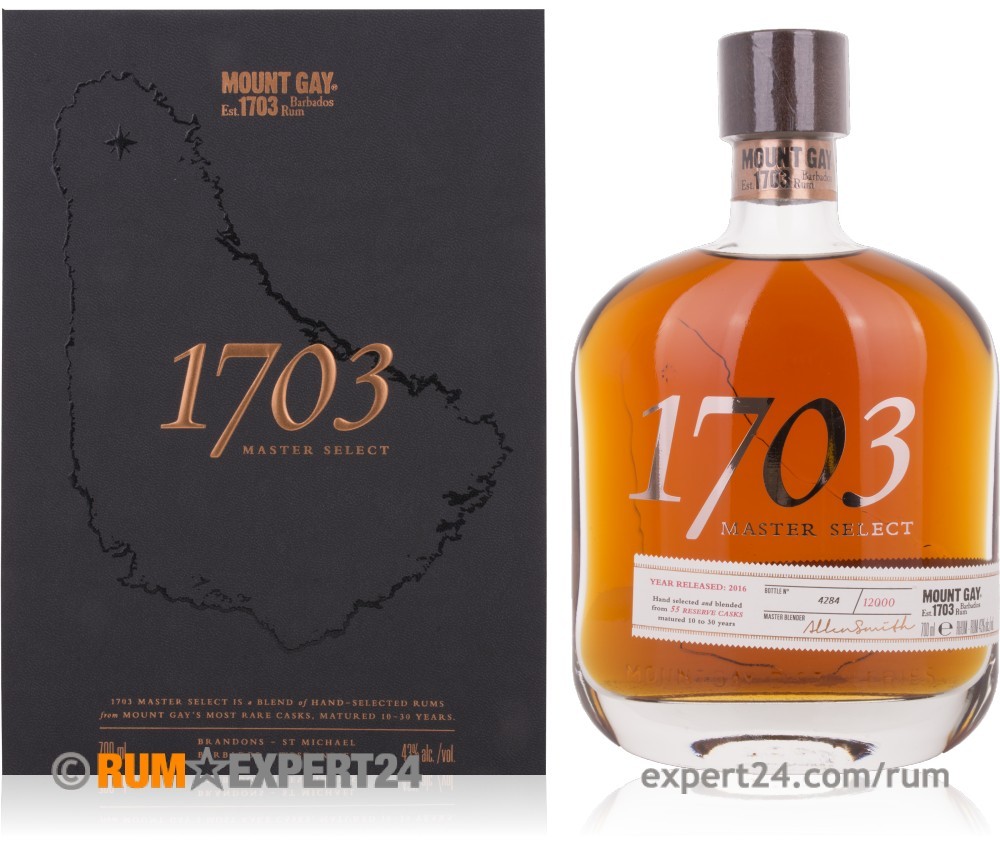 Amber-colored bottle of Mount Gay 1703 Master Select Dark Rum, 70 Cl, with a sleek glass design, featuring a black box with embossed island map and copper lettering.