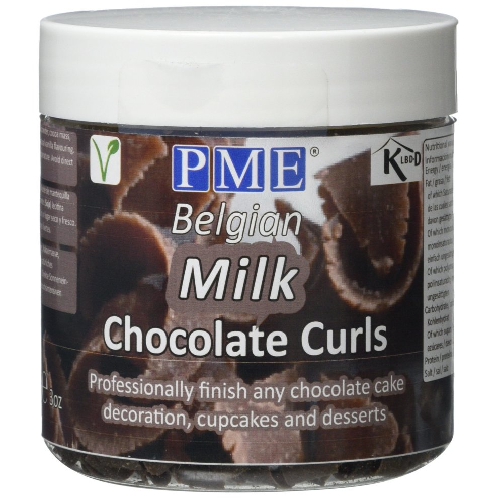 Clear plastic container filled with dark brown chocolate curls, labeled "PME Belgian Milk Chocolate Curls 85g," featuring a white lid and decorative text.