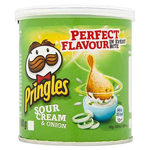 Green cylindrical tub of Pringles Sour Cream & Onion crisps, featuring a cartoon logo, with a white lid and text highlighting "Perfect Flavour in Every Bite" and nutritional info.