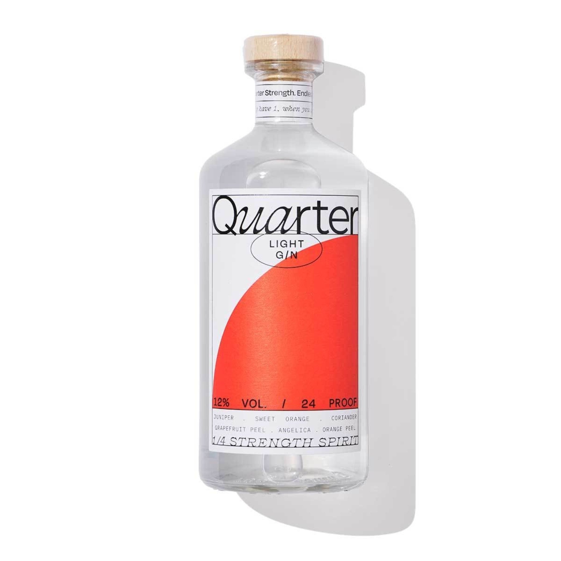Clear glass bottle with a cork stopper, featuring a bold red and white label that reads "Quarter" and "12% Vol. 24 Proof," showcasing a modern and minimalist design.