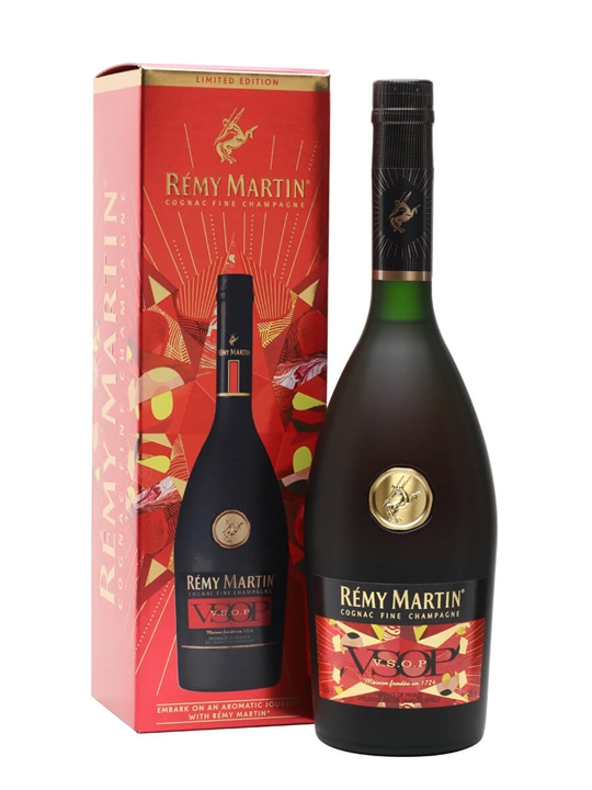 Remy Martin VSOP Cognac bottle in a sleek black design with a gold logo, presented in a vibrant red and gold limited edition box.