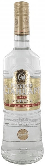 Clear glass bottle of Russian Standard Gold Vodka, 70 cl, with a gold and white label featuring ornate designs and a gold cap.