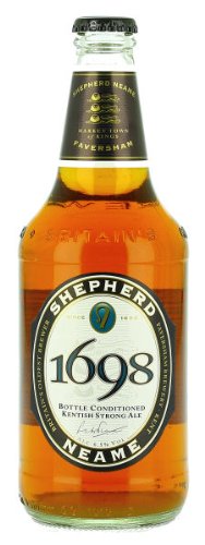 Eight bottles of Shepherd Neame 1698 Celebration Beer, featuring a dark amber liquid, a classic label with gold and black accents, and a distinctive bottle shape.