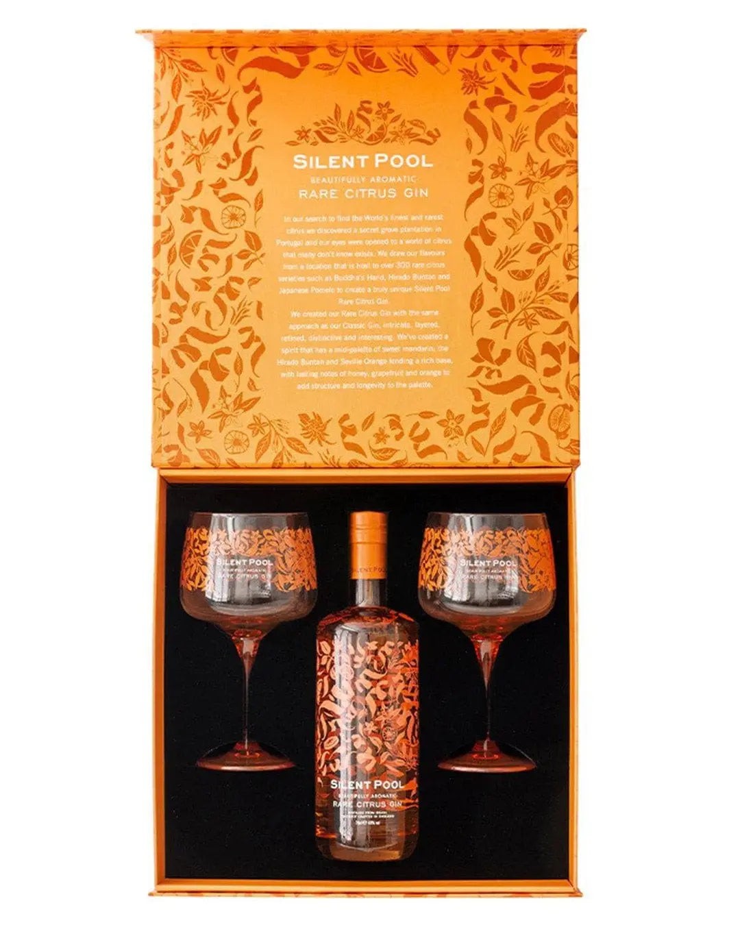 Silent Pool Rare Citrus Gin Gift Set featuring a 70 Cl bottle and two elegant glasses, all presented in a vibrant orange box adorned with intricate floral patterns.