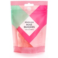 Pink and green packaging featuring a diamond-shaped label that reads "Sparkling Rosé Gummies," with a zigzag pattern at the bottom and a transparent window showcasing the gummies inside.