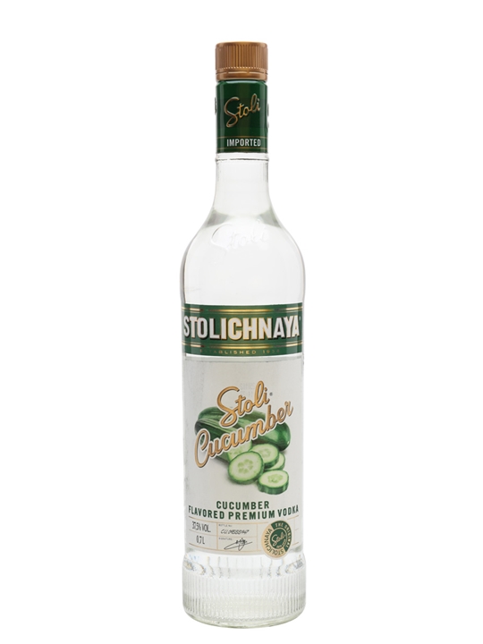 Clear glass bottle of Stolichnaya Cucumber Vodka, 70 Cl, featuring a green and white label with cucumber slices and a bronze cap.
