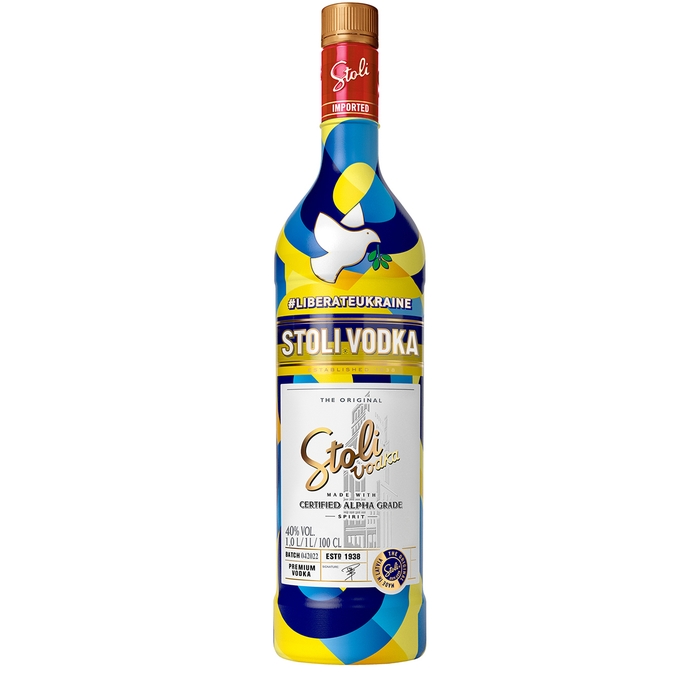 Limited Edition Stolichnaya Liberate Ukraine Vodka bottle features a vibrant blue and yellow design with a white dove, showcasing its 1 L capacity and 40% alcohol content.
