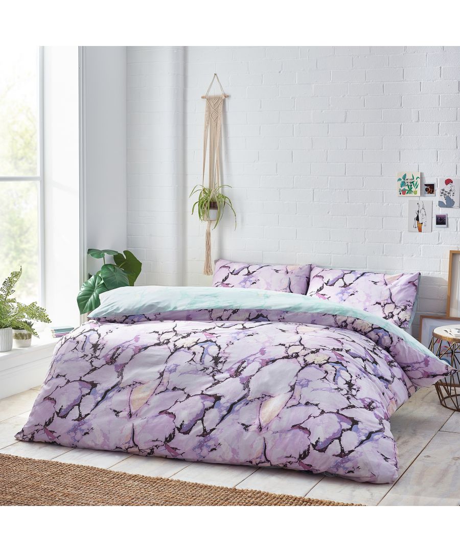 Lilac marble abstract reversible duvet cover set in cotton, featuring a striking design with shades of purple and white, includes matching pillowcases, suitable for a single bed.