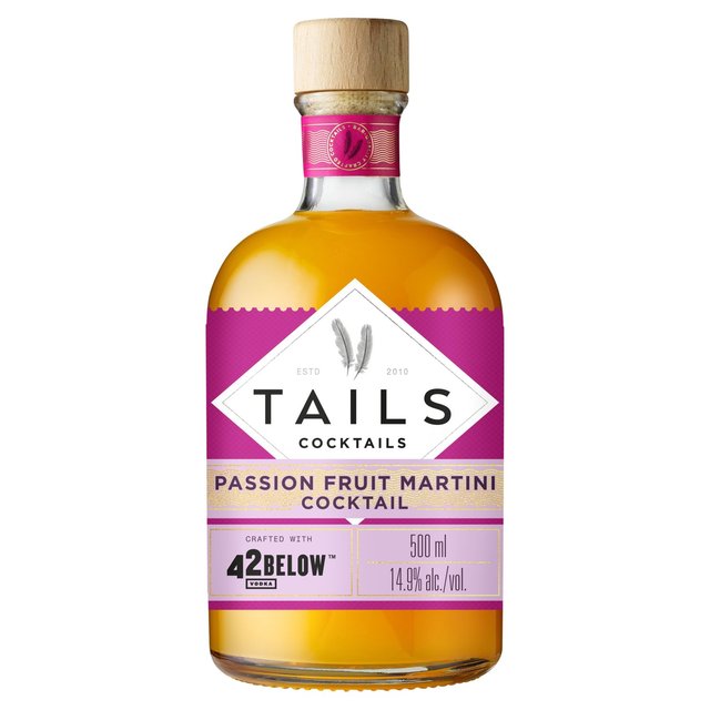 Clear glass bottle with a wooden cork, featuring a vibrant yellow-orange liquid, labeled "Tails Cocktails Passion Fruit Martini," with purple and white accents.