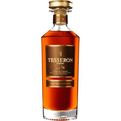 Tesseron Lot No. 76 XO Tradition Cognac in a clear glass bottle with a cork stopper, featuring a gold and brown label and deep amber liquid.