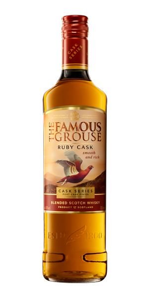 Amber-colored bottle of The Famous Grouse Ruby Cask Whisky, featuring a label with a bird, gold accents, and text highlighting its smooth and rich qualities.