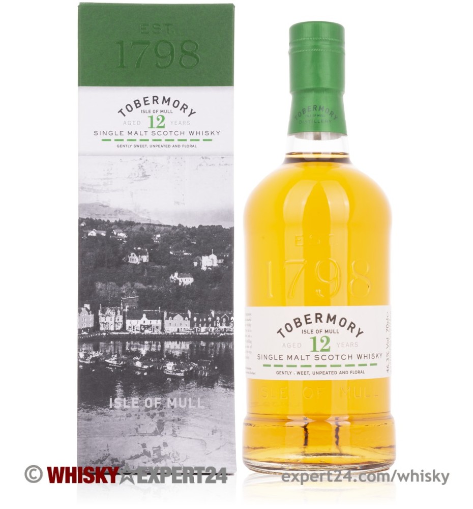 Tobermory 12 Year Old Island Single Malt Scotch Whisky in a clear bottle with a gold liquid, featuring a green label and a box displaying the distillery's heritage and landscape.