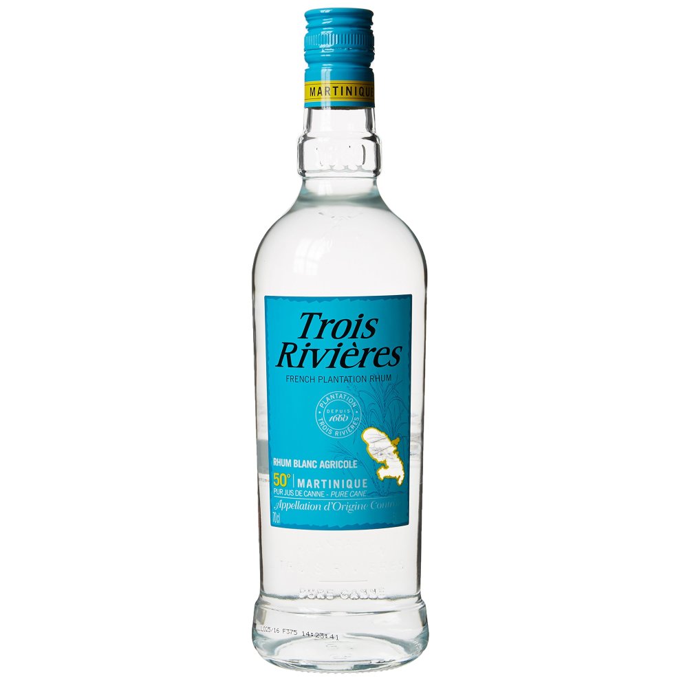 Clear glass bottle of Trois Rivieres Blanc Rum featuring a light blue label, yellow cap, and a butterfly logo, with "50cl" and "Martinique" prominently displayed.