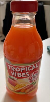 Bright orange beverage in a clear glass bottle with a red cap, featuring a colorful label that reads "Tropical Vibes Mango Carrot" and showcases mango and carrot imagery.