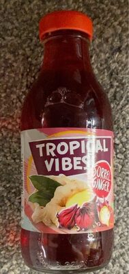 A clear bottle of Tropical Vibes Sorrel & Ginger drink, featuring a vibrant red liquid, a bright orange cap, and a colorful label with tropical graphics and text.