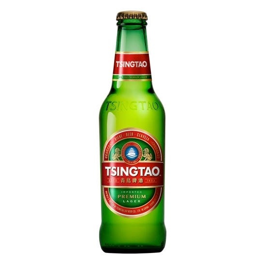 Green glass bottle of Tsingtao Premium Lager, featuring a red label with white text, gold cap, and a capacity of 330 ml, displayed against a plain background.