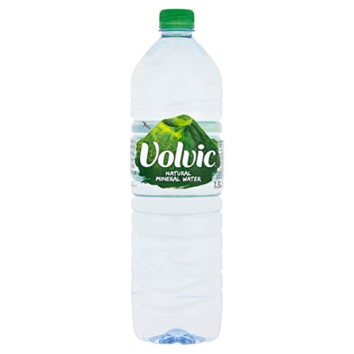 Clear plastic bottle of Volvic Natural Mineral Water, 1.5L, featuring a green cap and a label with a mountain graphic and the brand name in bold white letters.