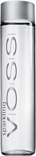 Clear glass bottle with a sleek design, featuring the word "VOSS" prominently in silver, containing sparkling artesian water, presented in a 24-pack.