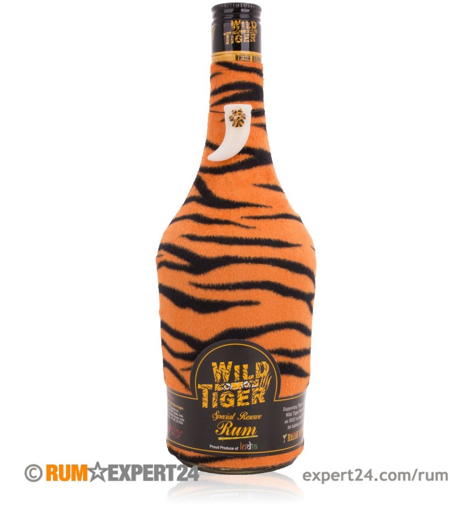 Wild Tiger Special Reserve Rum in a distinctive bottle covered in orange and black tiger stripes, featuring a gold label and a unique curved shape.