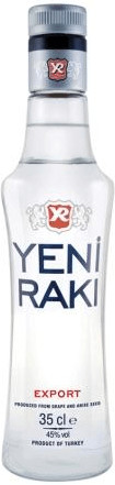 Clear glass bottle of Yeni Raki, 35 cl, featuring a prominent label with red and blue text, and a silver cap, showcasing the drink's traditional Turkish spirit.