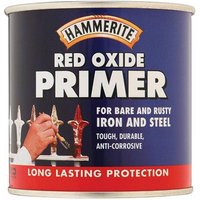 Hammerite red oxide primer can, 250ml, blue label with white text and image of hand painting metal.