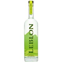 Leblon Natural Cane Cachaca 70cl bottle with green label and yellow accents, clear glass showcasing the spirit.