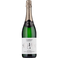 Green bottle of Noughty Sparkling Chardonnay 0% with gold foil and white label featuring black and silver text.