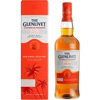 The Glenlivet Caribbean Reserve whisky bottle with red label and matching box featuring palm trees.